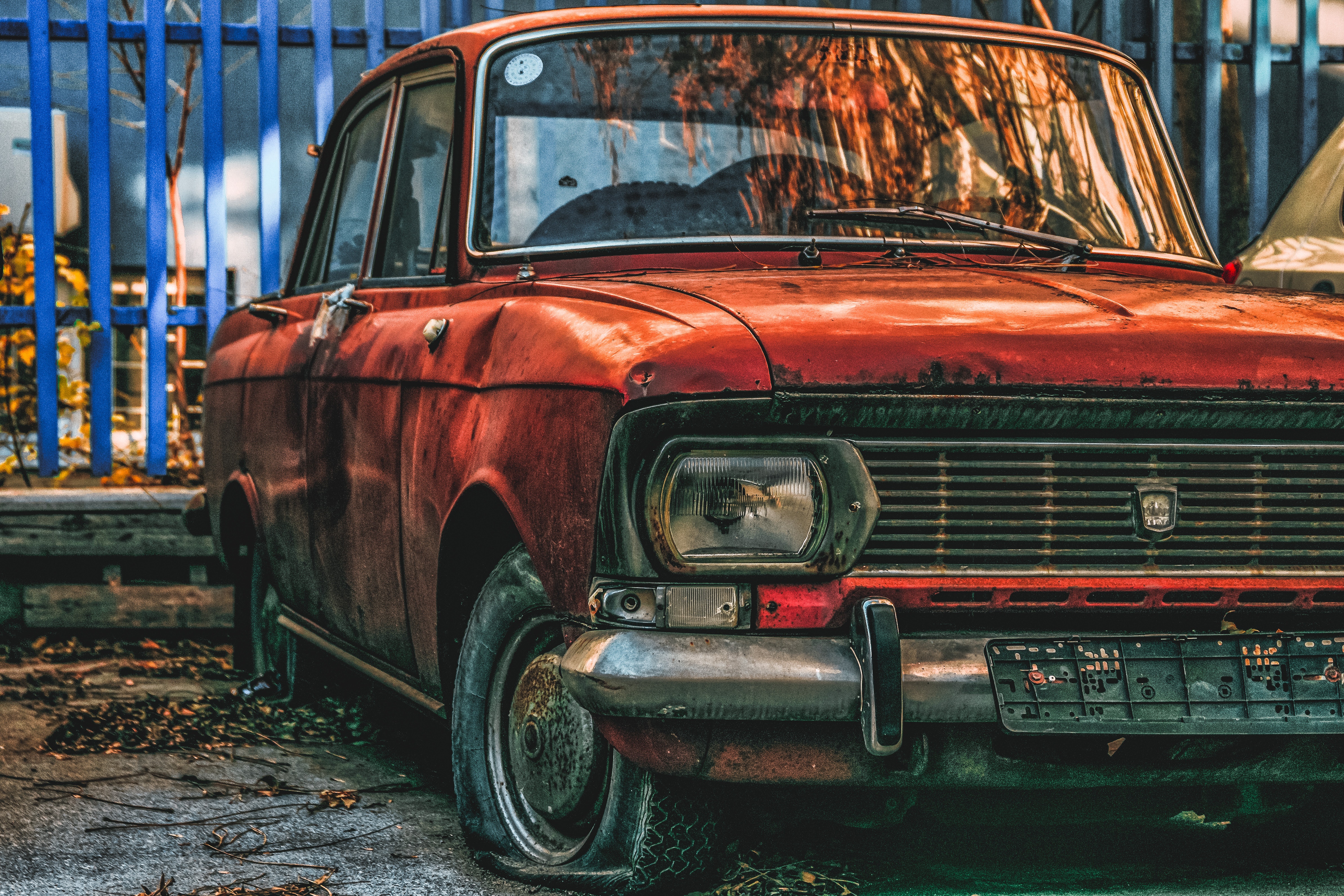 abandoned orange sedan 746684 - Sell Your Junk Car